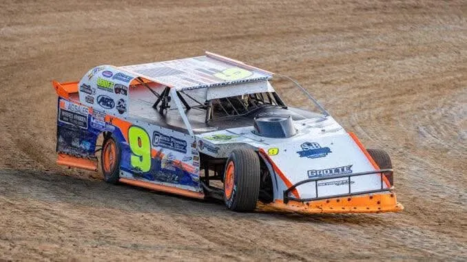 A dirt modified racing hard on the Coos Bay Speedway oval