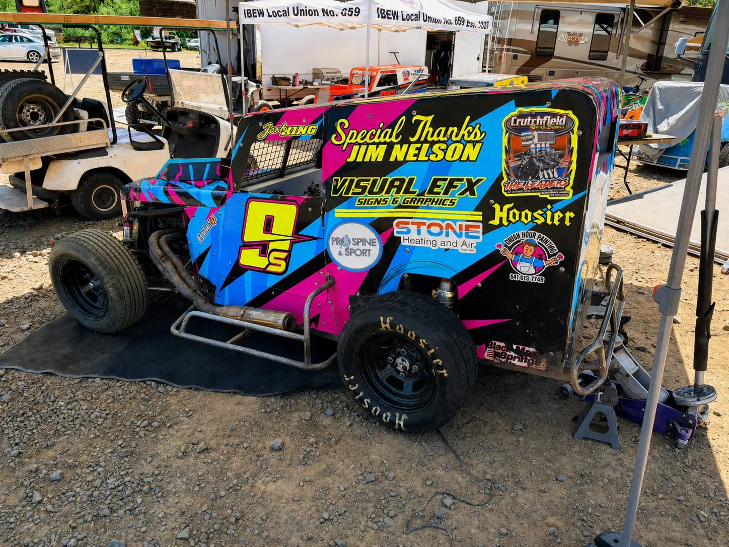 Sprint car sliding through a corner on the dirt oval